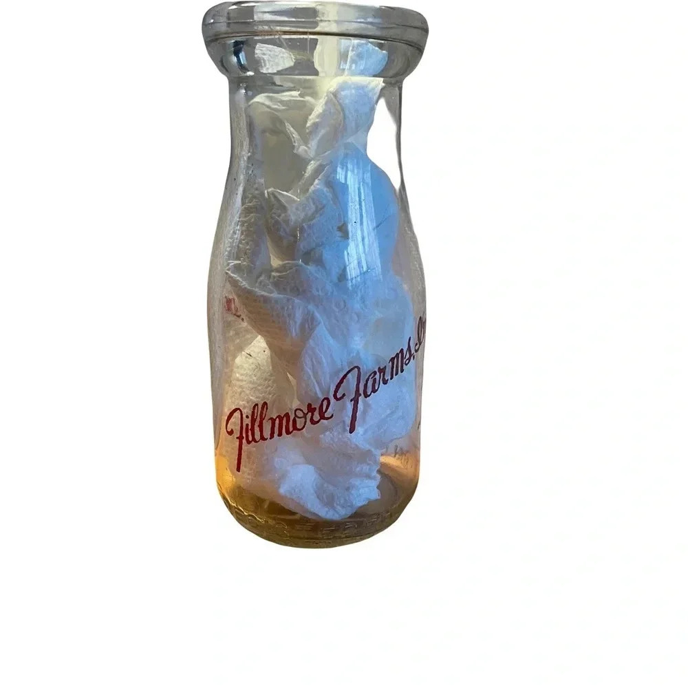 Fillmore farms, Inc milk glass 5 1/2 tall some scratches on it